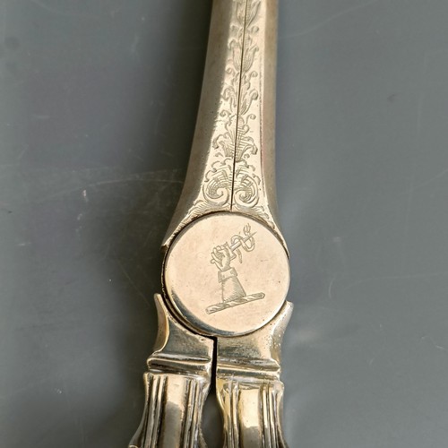 198 - A pair of Victorian silver grape scissors, with engraved decoration, crested, marks indistinct, 2.6 ... 