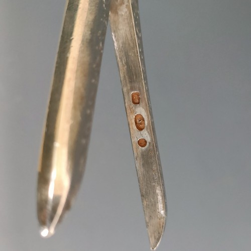 198 - A pair of Victorian silver grape scissors, with engraved decoration, crested, marks indistinct, 2.6 ... 