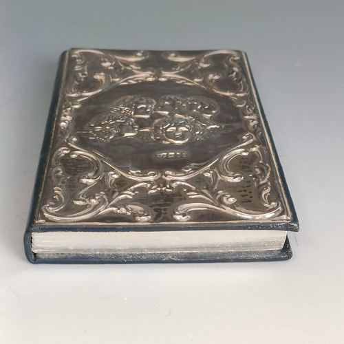 199 - A Victorian style silver mounted address book, decorated cherubs, London 1990, 8 cm wide