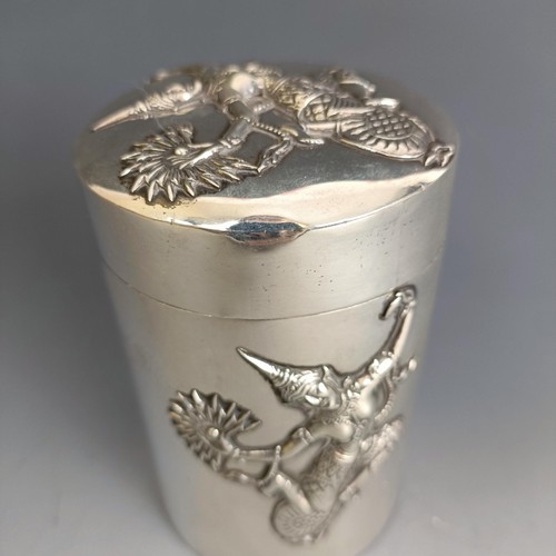 208 - An Indian silver coloured metal box and cover, decorated dancing figures, 12 cm high