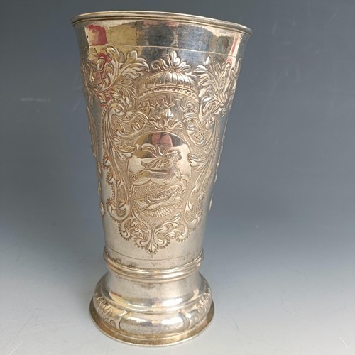 211 - A Russian silver beaker of tapering cylindrical form, embossed figures, flowers and foliage, marks i... 