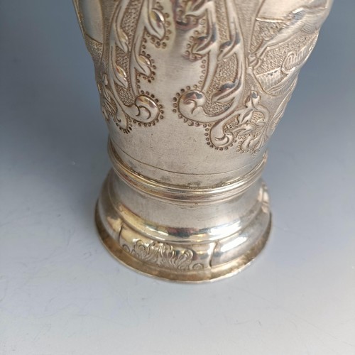 211 - A Russian silver beaker of tapering cylindrical form, embossed figures, flowers and foliage, marks i... 