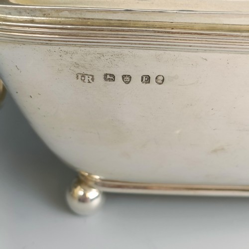 212 - A pair of George III silver dishes and covers, with pineapple style finials and rams mask ring handl... 