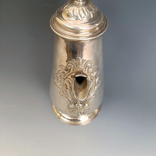 213 - A mid 18th century silver coffee pot, of baluster form, embossed flowers, marks rubbed, probably Lon... 