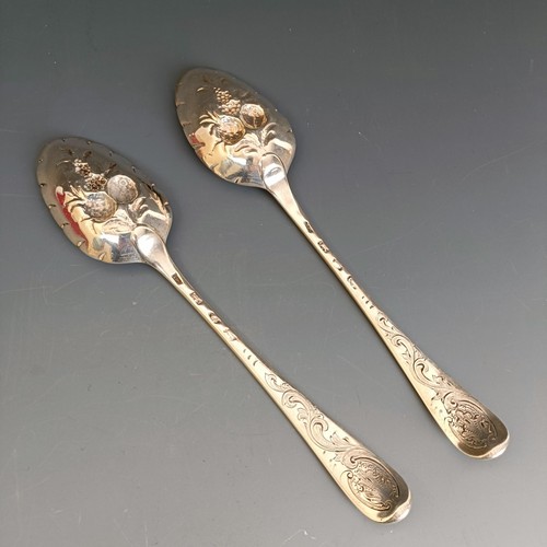 220 - A pair of 18th century silver berry spoons, marks indistinct, 4.1 ozt