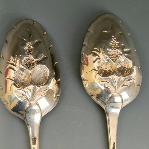 220 - A pair of 18th century silver berry spoons, marks indistinct, 4.1 ozt