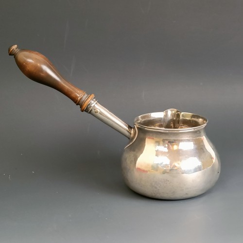 222 - An 18th century silver brandy warmer, initialled to the base, with a wooden handle, London 1731, 3.7... 