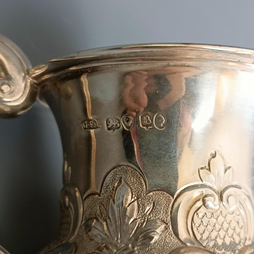 231 - A William IV silver christening mug, of vase form, embossed flowers and foliage, London 1837, 4.1 oz... 