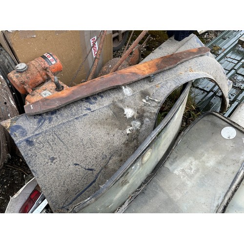 7 - Assorted body panels, spares and items, from a Triumph TR4/4A/5, barn stored (qty)