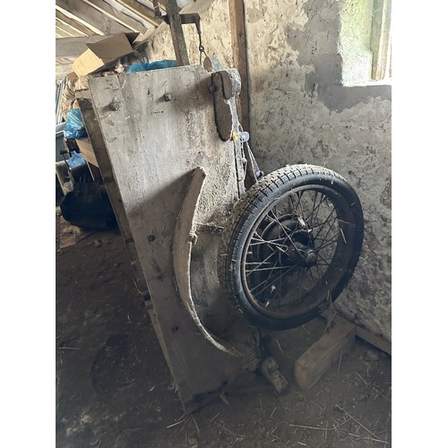 8 - An old trailer, probably based on an Austin 7, with springs and wire wheels, barn stored