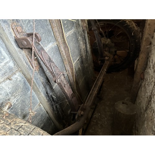 8 - An old trailer, probably based on an Austin 7, with springs and wire wheels, barn stored