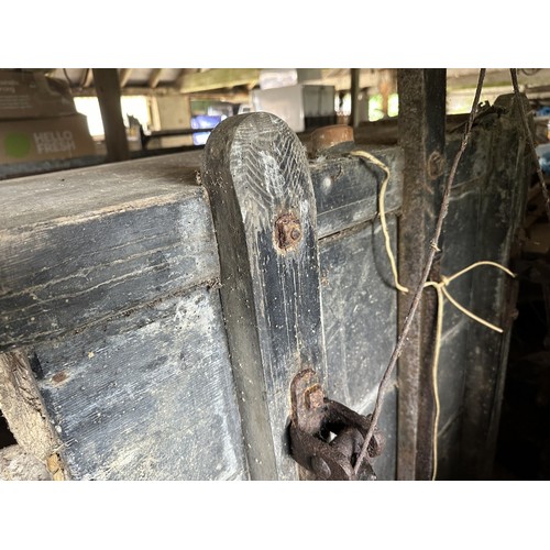 8 - An old trailer, probably based on an Austin 7, with springs and wire wheels, barn stored