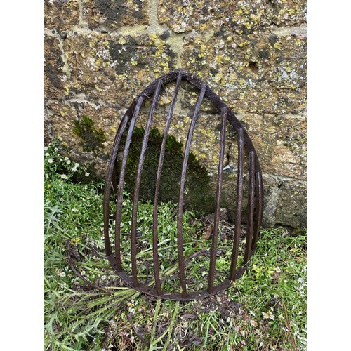 14 - A metal corner hayrack