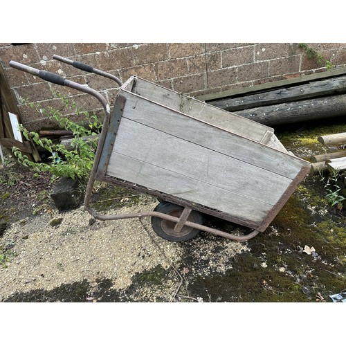 38 - A metal and wood garden/yard barrow or trolley