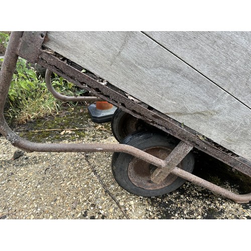 38 - A metal and wood garden/yard barrow or trolley