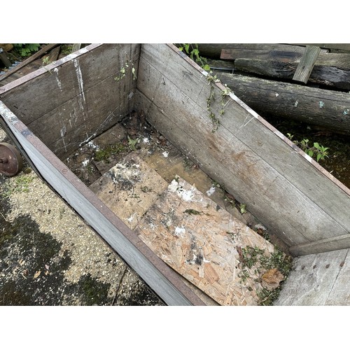 38 - A metal and wood garden/yard barrow or trolley