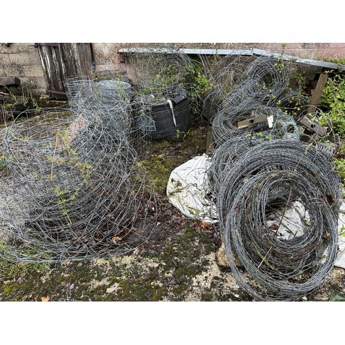 42 - A large quantity of fencing wire and barbed wire