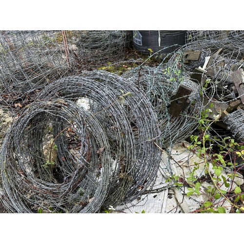 42 - A large quantity of fencing wire and barbed wire