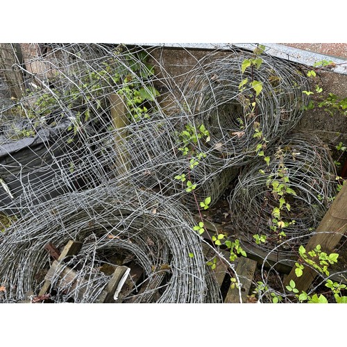 42 - A large quantity of fencing wire and barbed wire