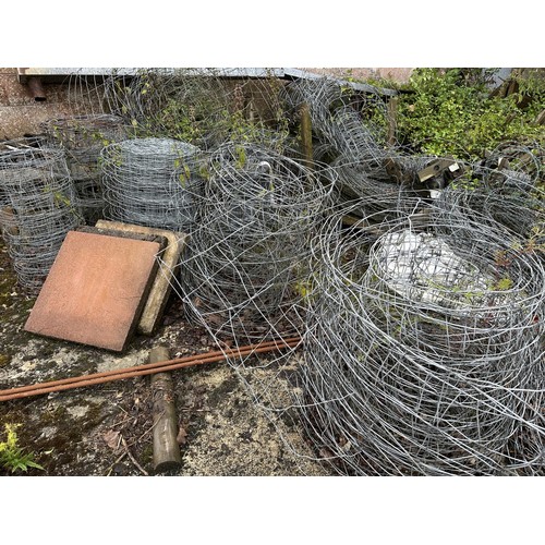 42 - A large quantity of fencing wire and barbed wire