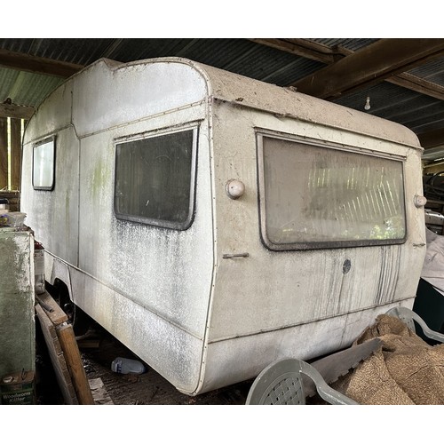 53 - A vintage caravan, barn stored on blocks for many years