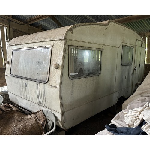 53 - A vintage caravan, barn stored on blocks for many years