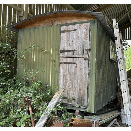 54 - ***Regretfully withdrawn*** A Victorian shepherd's hut, with a draw bar and steps, ideal to use as i... 