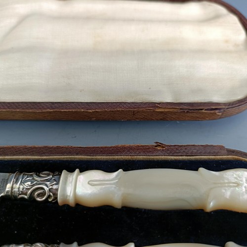 238 - A silver and mother of pearl three piece christening cutlery set, Birmingham 1860, cased