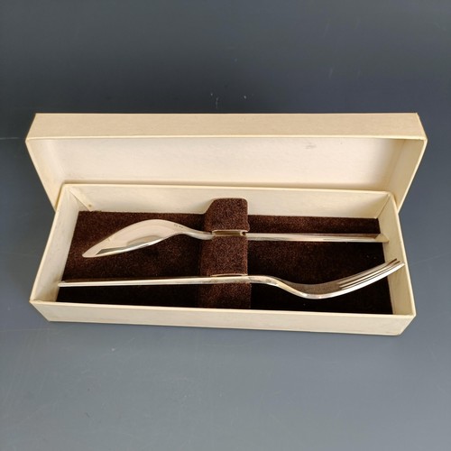 239 - A Danish silver spoon and fork set, Georg Jensen, boxed