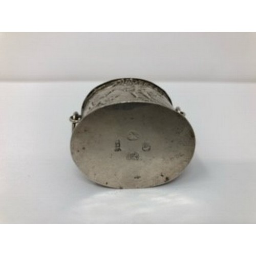 248 - A Dutch silver coloured metal child's basket, with embossed and pierced decoration, 5 cm wide