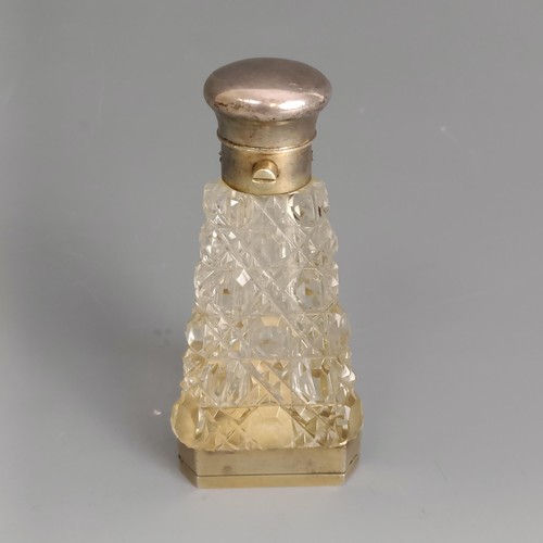 249 - A late Victorian cut glass and silver gilt coloured metal combined scent bottle and vinaigrette, of ... 