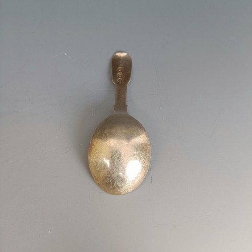 259 - A George III silver caddy spoon, decorated acorns and leaves