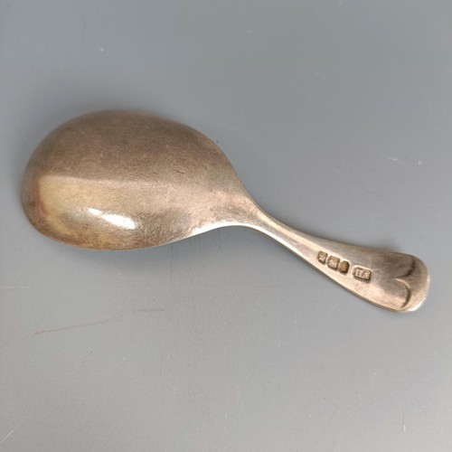 261 - A George III style silver caddy spoon, Sheffield 1900