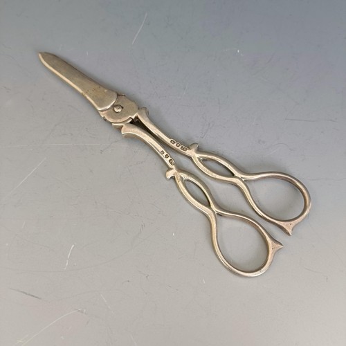 283 - A pair of 18th century silver grape scissors, marks indistinct