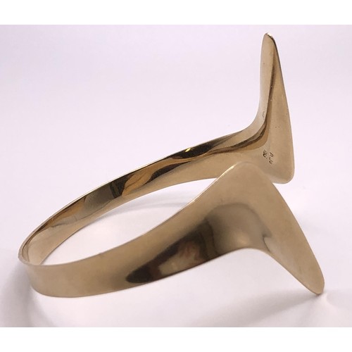 501 - A 14ct gold bangle, 18.3 g