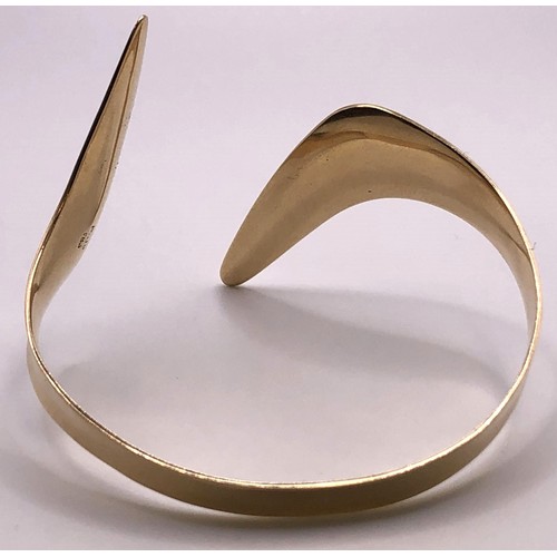 501 - A 14ct gold bangle, 18.3 g