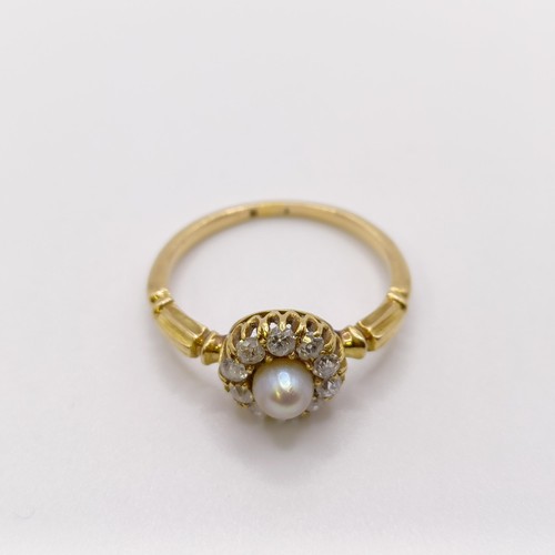 520 - An 18ct gold, diamond and cultured pearl ring, ring size O