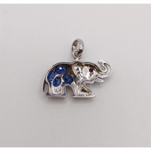 527 - An 18ct white gold, diamond and sapphire pendant, in the form of an elephant...