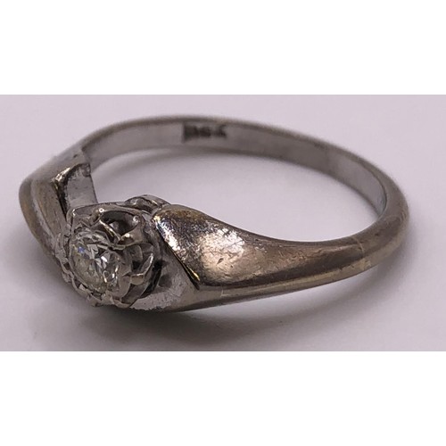 529 - An 18ct white gold and solitaire diamond ring, ring size N...