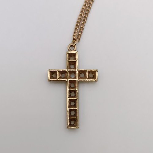 530 - An early 20th century yellow metal and cultured pearl cross pendant, on a yellow metal chain, in a v... 