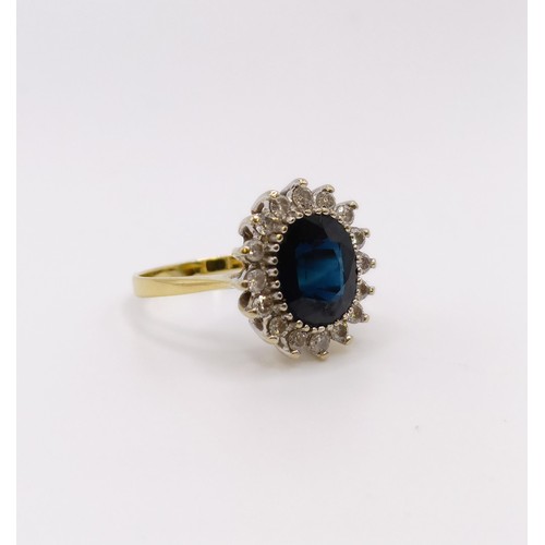 531 - An 18ct gold, diamond and sapphire ring, ring size M