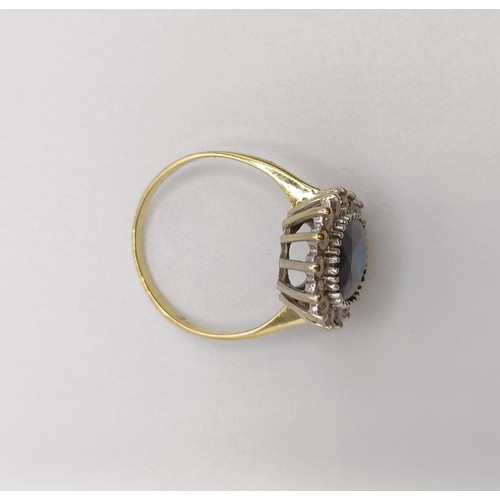 531 - An 18ct gold, diamond and sapphire ring, ring size M