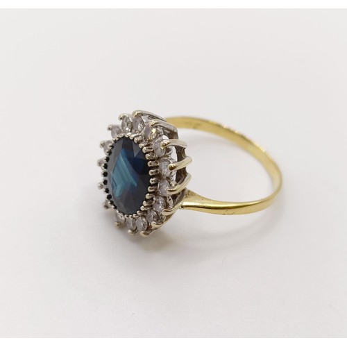 531 - An 18ct gold, diamond and sapphire ring, ring size M