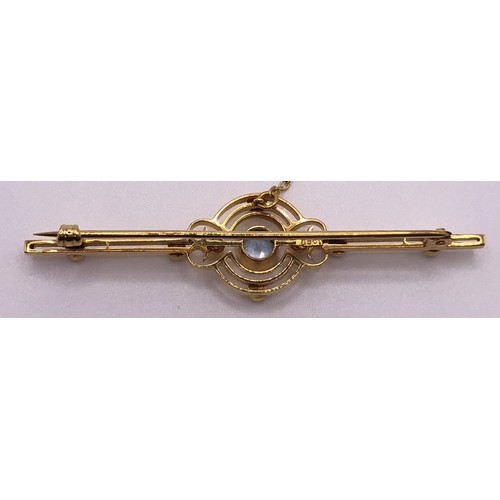 544 - A 9ct gold, aquamarine and seed pearl bar brooch, in a vintage jewellery box, with a retail mark for... 