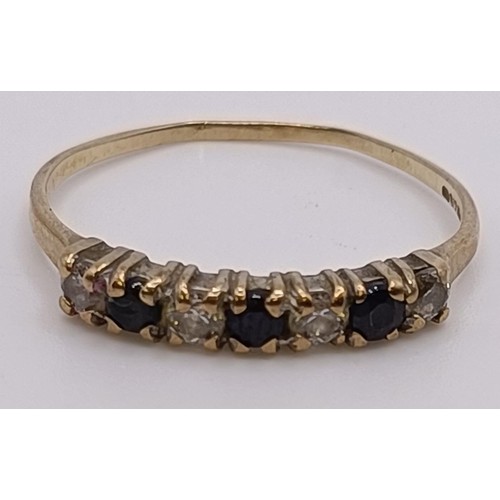 551 - A 9ct gold bangle, 5.1 g, and other jewellery (7)