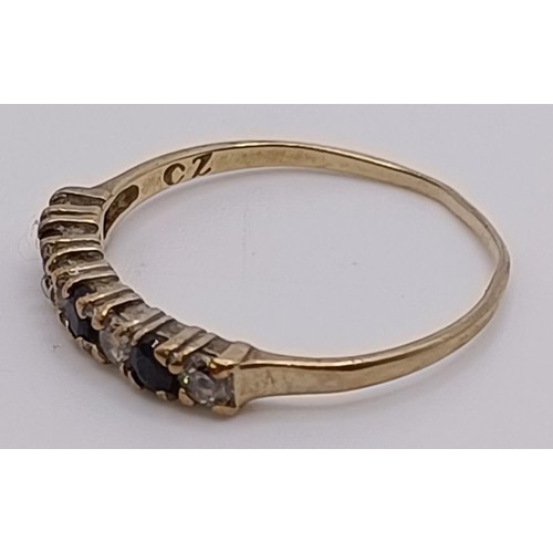 551 - A 9ct gold bangle, 5.1 g, and other jewellery (7)