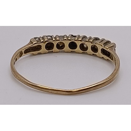 551 - A 9ct gold bangle, 5.1 g, and other jewellery (7)