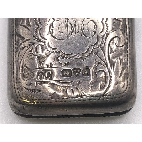 559 - A late Victorian silver vesta, on a silver plated Albert (2)