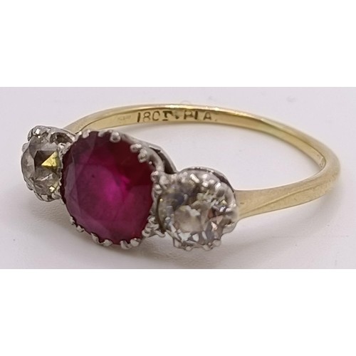 560 - An 18ct gold, ruby and diamond ring, ring size P