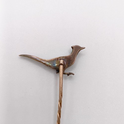 563 - A late 19th/early 20th century stick pin, in the form of a pheasant